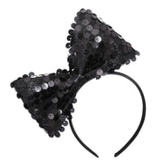 Op deze afbeelding zie je een Accessoires, van het merk Widmann. Hoofdband Met Paillettenstrik Zwart