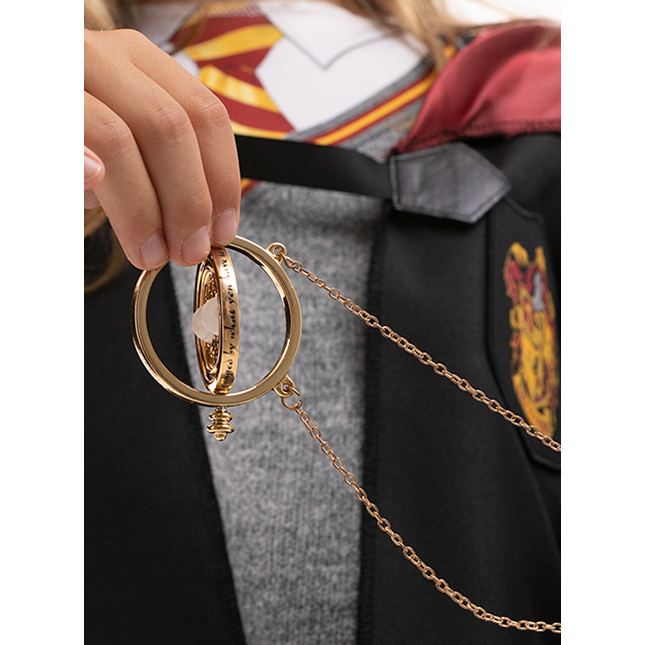 Op deze afbeelding zie je een Accessoires, van het merk Funidelia. Hermelien Timeturner Ketting