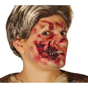 Op deze afbeelding zie je een Accessoires, van het merk Guirca. Halloween Half Open Mondwond