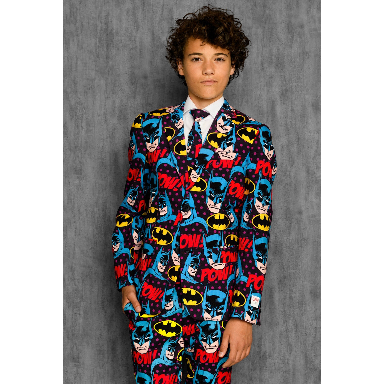 Op deze afbeelding zie je een Kostuums, van het merk Opposuits. The Dark Knight Comics Batman™ Strip Tiener Jongen Kostuum