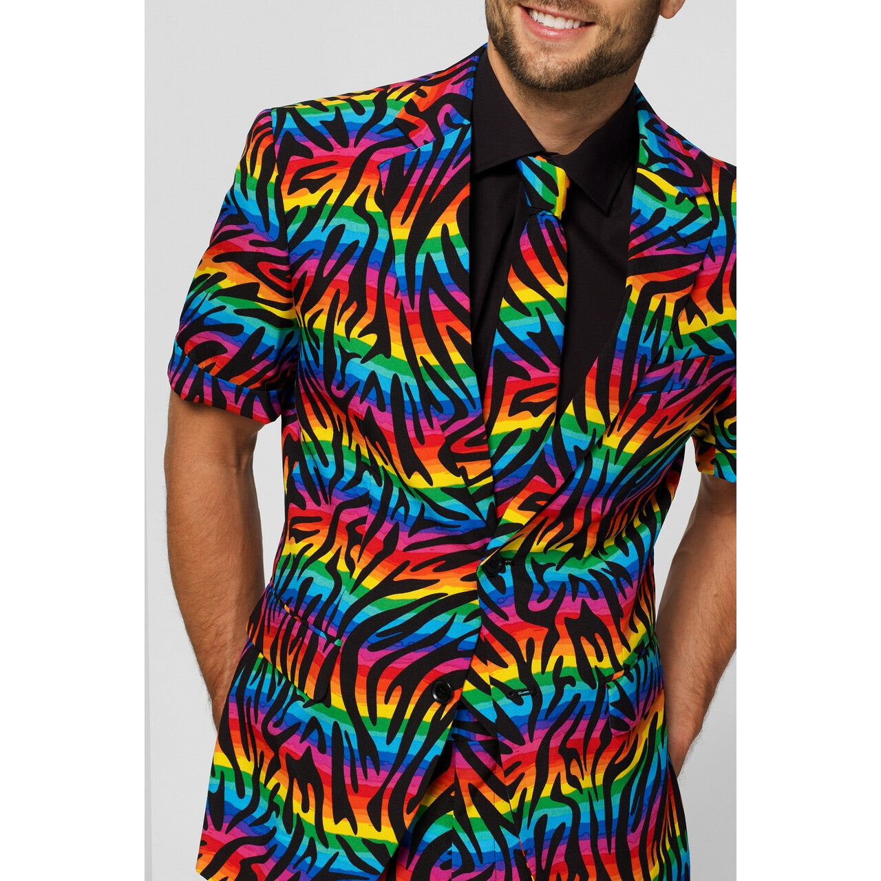 Op deze afbeelding zie je een Kostuums, van het merk Opposuits. Wild Rainbow Zomer Man Kostuum