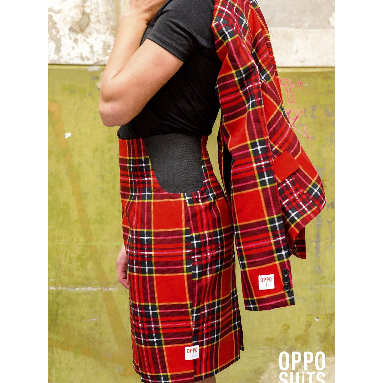 Op deze afbeelding zie je een Kostuums, van het merk Opposuits. Schotse Lumberjackie Opposuit Vrouw Kostuum