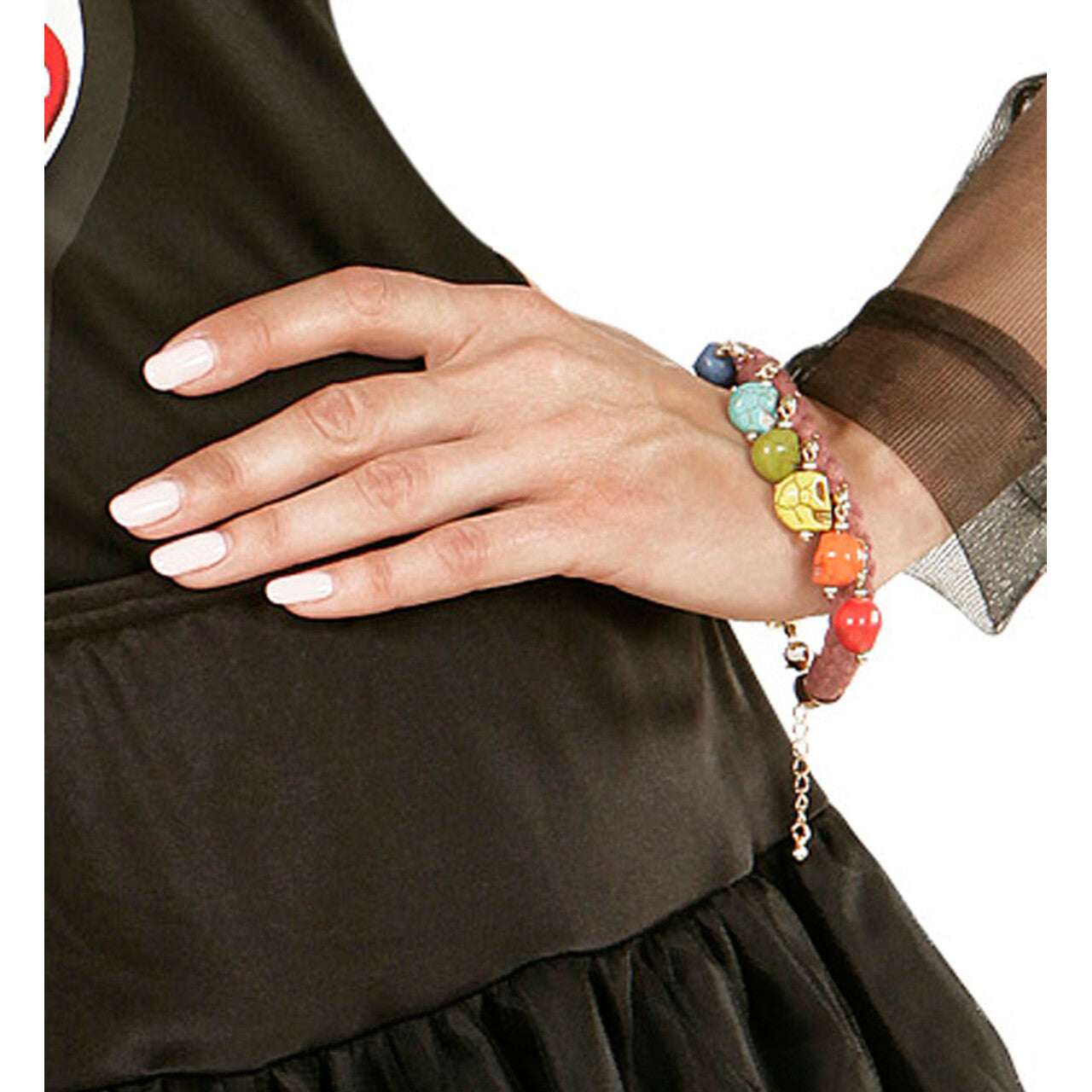 Op deze afbeelding zie je een Accessoires, van het merk Widmann. Happy Halloween Koord Armband Met 7 Gekleurde Schedels