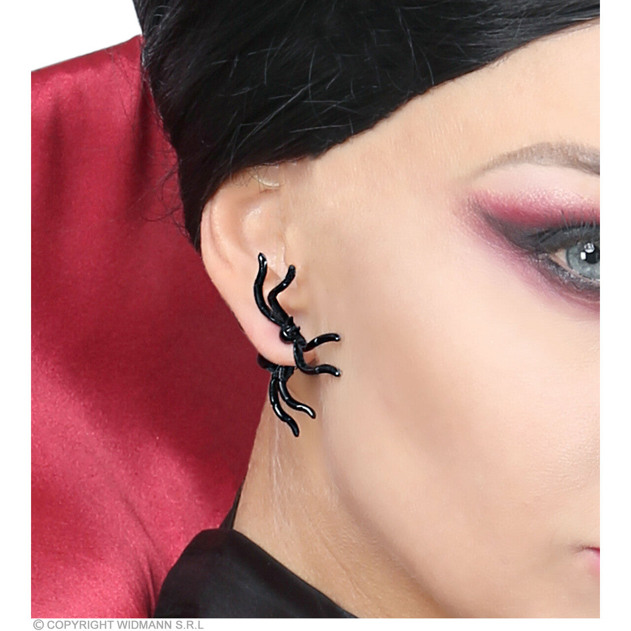 Op deze afbeelding zie je een Accessoires, van het merk Widmann. Spinnen Knopjes Oor Halloween