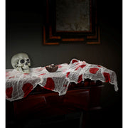 Op deze afbeelding zie je een Decoratie, van het merk Widmann. Halloween Tafelkleed Gaas En Bloed 180 Bij 80 Centimeter